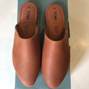 Brand new Tom’s leather mules.